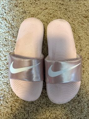 Nike Girl’s Light Pink Slide Sandals with White Swoosh
